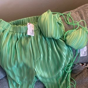 Top is size Large and the bottom pants are size Small